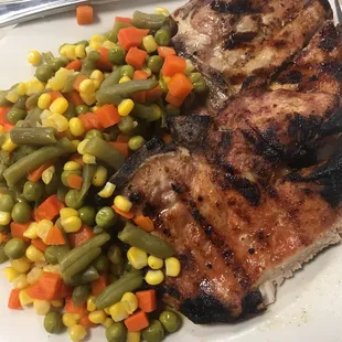 Pork chop meal. Guess veggies were out of the freezer?