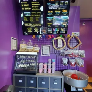 Menu for milk tea and popcorn (2/2023) with popcorn sizes, leis, roasted nuts, candy, and cotton candy.
