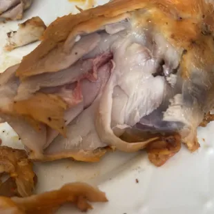 Rubbery and pink chicken