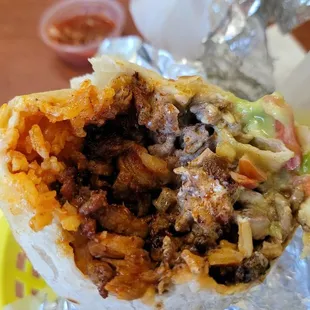 Carne asada and al pastor super burrito