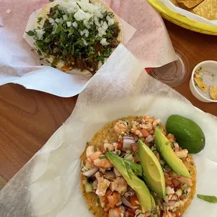 tostada with shrimp ceviche and carnitas taco (exrra onion and cilantro)
