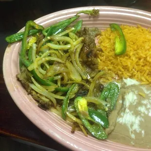 Carne Asada...it&apos;s in there somewhere. Buried under green peppers (seeds included!).