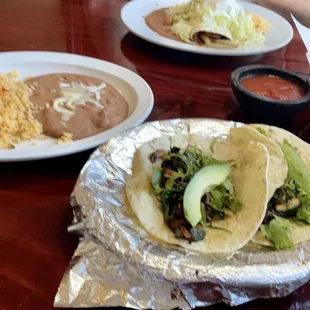 Vegetarian E (2 soft tacos with spinach, zucchini &amp; avacado). La Antigua Burrito