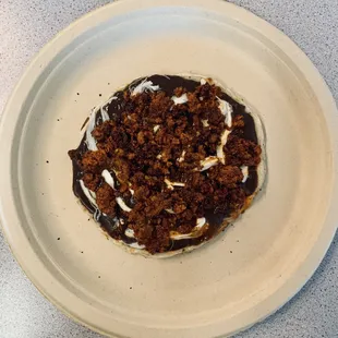 Memela/Pellizcada with mole, quesillo, and chorizo at La Asuncion. Photo Courtesy: Isabel Castro-Melendez.