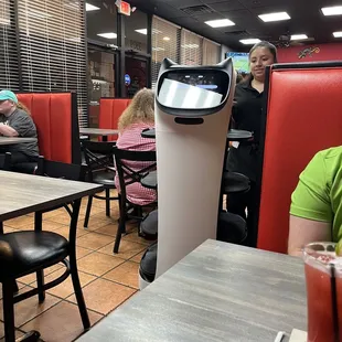 Robot food delivery station