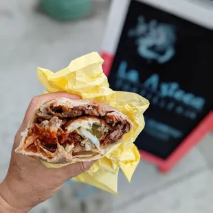 Chile relleno burrito with asada and beans.