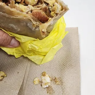 Only ate a little less than half because I kept biting &amp; crunching on eggshells. Pity because the burritos are great... my only complaint.