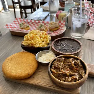 Criollo breakfast and a side order of arepitas with chicken salad.