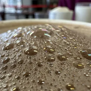 The hot chocolate foam.