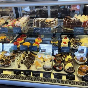 Cakes by the slice, pastries, cigars, eclairs, fruit tarts so pretty they almost look unreal.