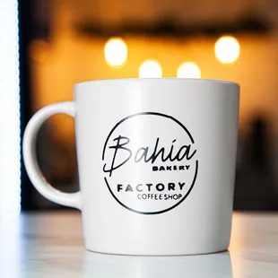 a white coffee mug on a table