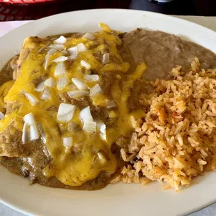 3 beef enchiladas with rice and refried beans