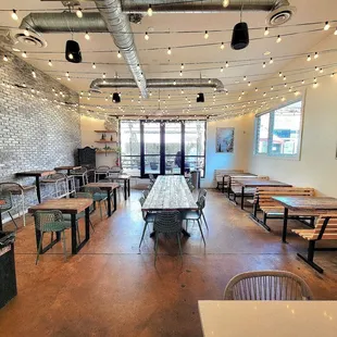 The dining room is at the back of the restaurant. Outdoor seating is through the back doors.