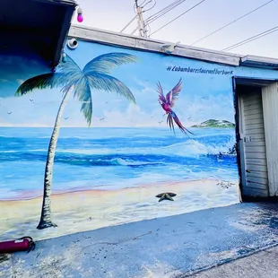 Cool mural on the side of this joint