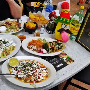 a table full of mexican food