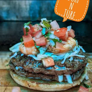 Beef pattie(s), Grilled shrimp, Pico de Gallo, cheeseb and your choice of hot or mild salsa.