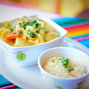Chicken soup with side of rice