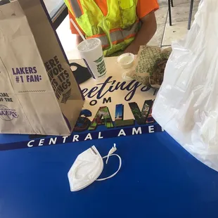My food from this place and his wings from the next door