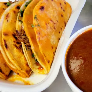 Birria Quesa-Tacos with a side of Consome.