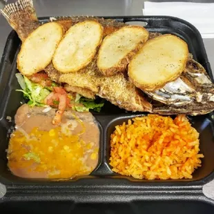 Mojarra Frita to go please.