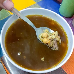 Consomme de Borrego con arroz, garbanzo y trocitos de carne (lamb soup)