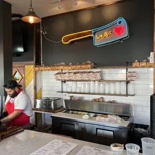 a man preparing food in a restaurant