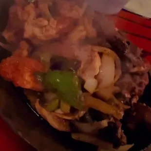 Part of my mixed fajitas.  Chicken, shrimp, and steak were seasoned to perfection!! Yummy!!