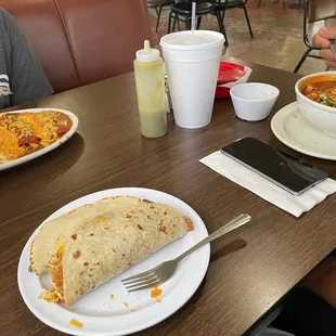 Chicken Enchilada Lunch Plate, Menudo, asada taco, Chilaquiles Taco.