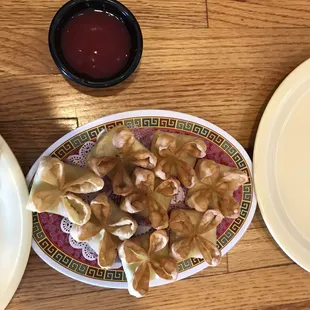 We&apos;re addicted!!!! Their sweet and sour sauce is tangy and tasty! These little 8 Crab Puffs come out HOT and FRESH!!!