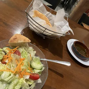 Garden salad with house dressing, fresh warm bread with olive oil & pesto for dipping.