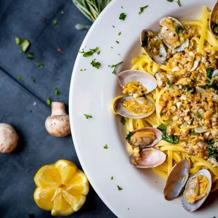 a plate of pasta with clams