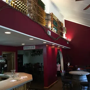 a wine tasting room with a wine rack