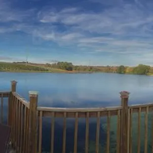 a view of a lake from a deck