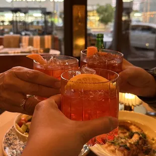 a group of people toasting