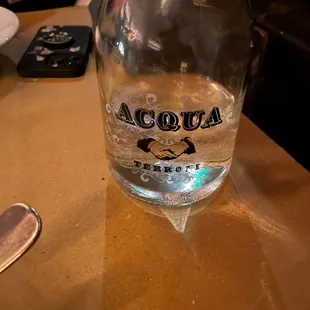 a bottle of water on a table