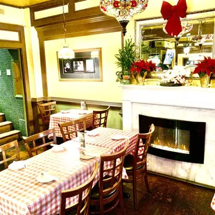 a dining room with a fireplace