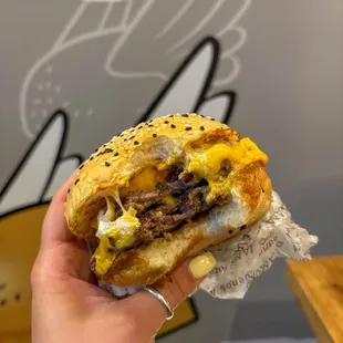 A bite into the golden burger