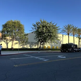 a man walking across the street