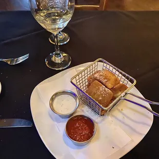 a plate of food and a glass of water