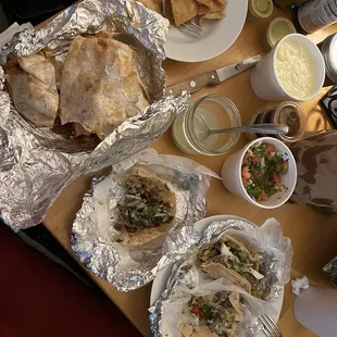 Chips, queso, pico, birria borrito, abuella&apos;s bistec, lengua &amp; nopales tacos.