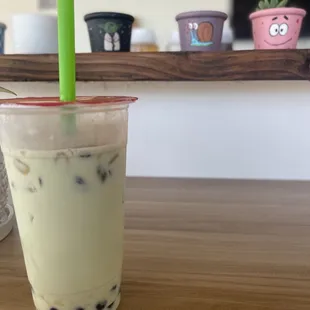 Pistachio milk tea with boba