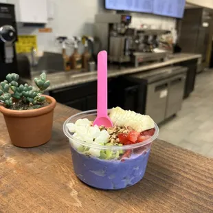Regular ube açaí bowl with strawberries, banana, kiwi, pecans, and mochi