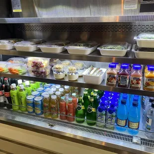 Salads, yogurt, and drinks.