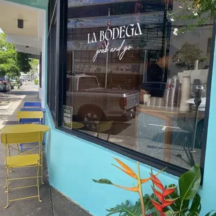 There&apos;s a couple of tables outside. La Bodega means grab and go. They are right next door to Kailua Seasoning Co. same owners.