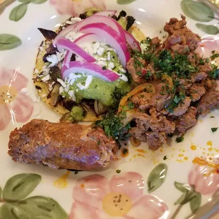 Roasted Brussels sprout tostada with Tomatillo Chermoula, chorizo and al pastor: meats and ingredients for the tostadas sourced here.