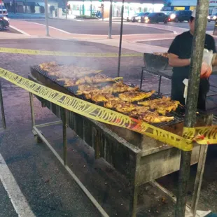 a man grilling food