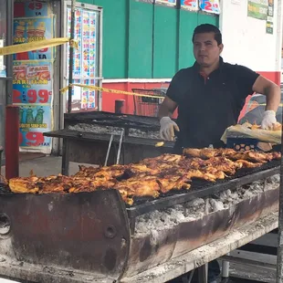 Grilled chicken on charcoal