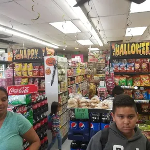a woman and a boy in a store