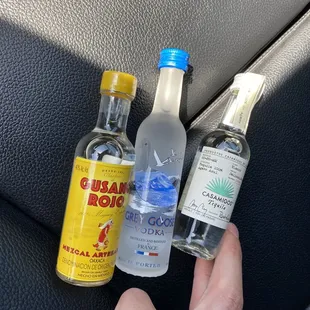 You can find a large bar of mini bottles at the register!