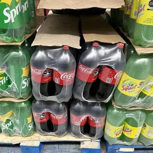 a stack of soda bottles